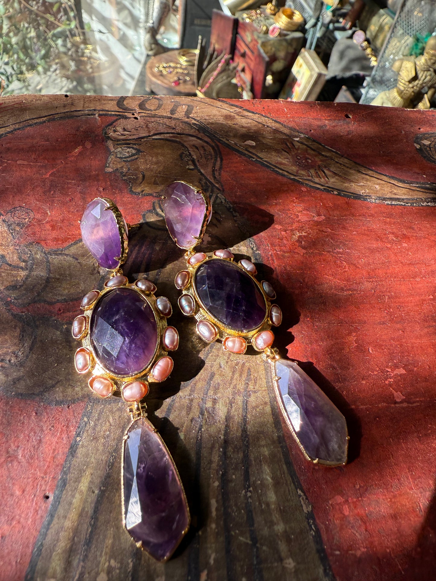 Orecchino Regina viola